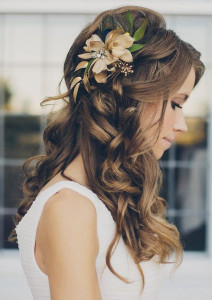 Wedding hair style long curl with flower accessory by Les Ciseaux St. Armands