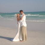 Bride and Groom beach wedding. Wedding hair and make up by Les Ciseaux